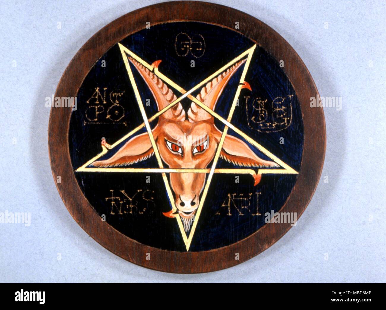 MAGICAL ALPHABETS - head of the Sabbatic goat, after Eliphas Levi, set in pentagram. This talisman is designed to take five sigillisations, in the form of magical alphabets. Made by Graham Fenn-Edwards. Stock Photo
