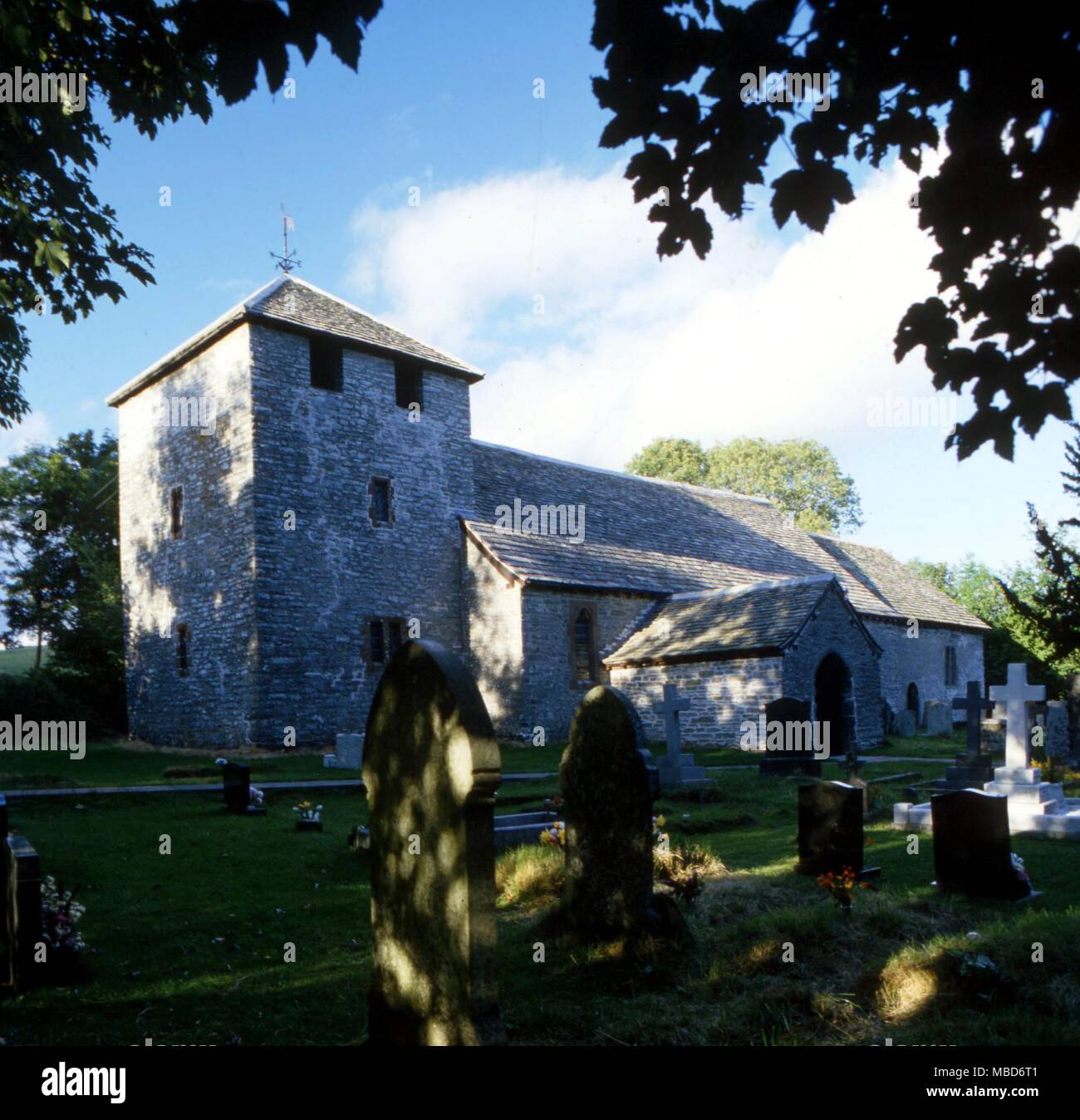 DRAGON - Llandeilo Graban - the tower of Llandeilo Graban church which was once said to be the nest of a dragon. Stock Photo