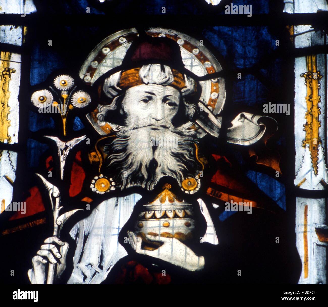 Joseph of Arimathea with the Holy Grail, and the flowering Thorn. Stained glass window in Kilkhampton church, Cornwall, Nineteenth century. Stock Photo