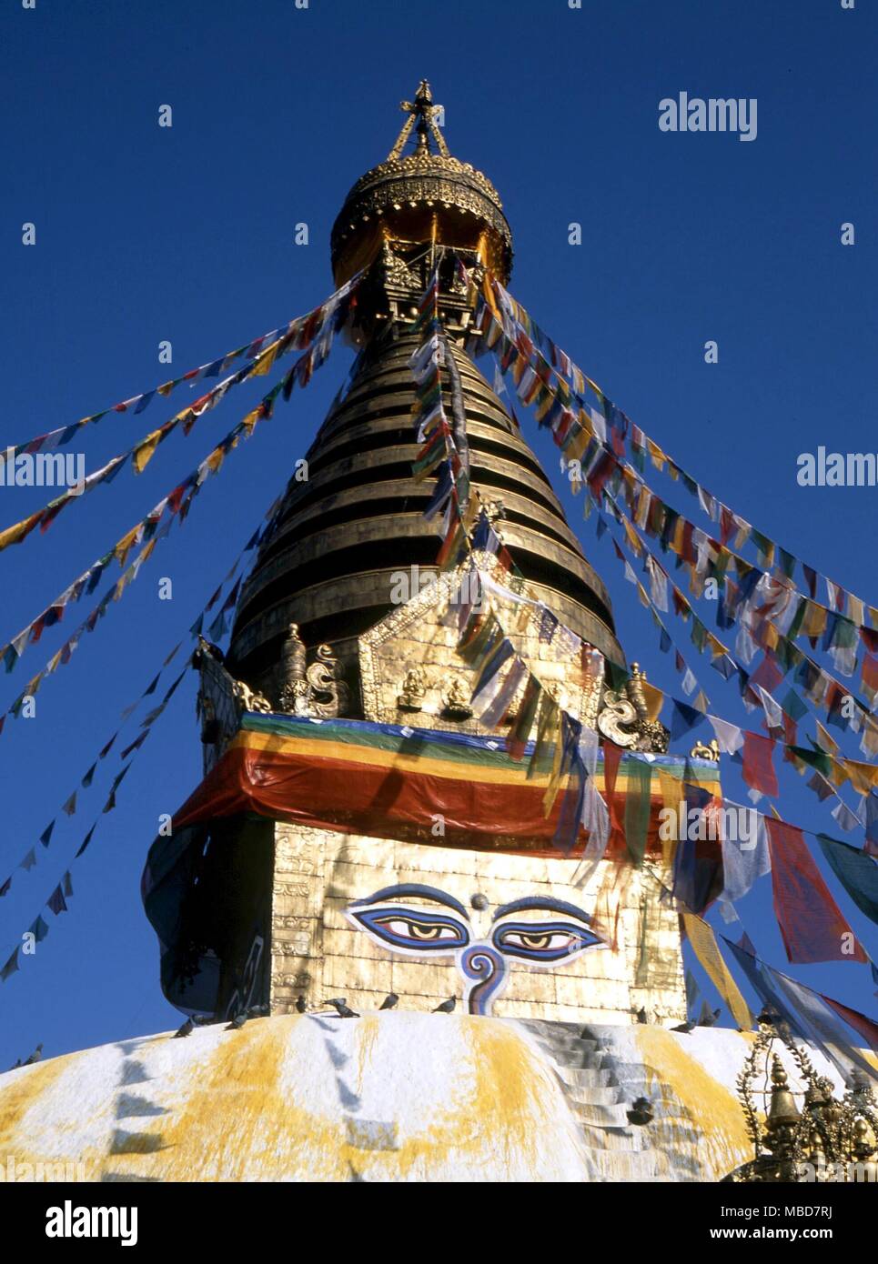THIRD EYE - The symbol of the third eye, the ek (the number one, symbol of unity) between the two eyes of God, on the tower of the Swayambhunath temple, Kathmandu, Nepal Stock Photo