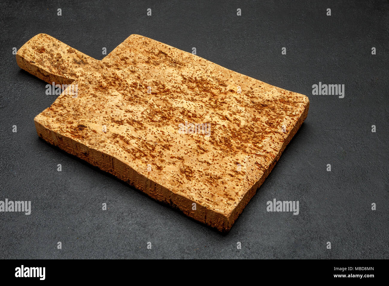 Decorative Wooden Serving Or Cutting Board On Concrete Background