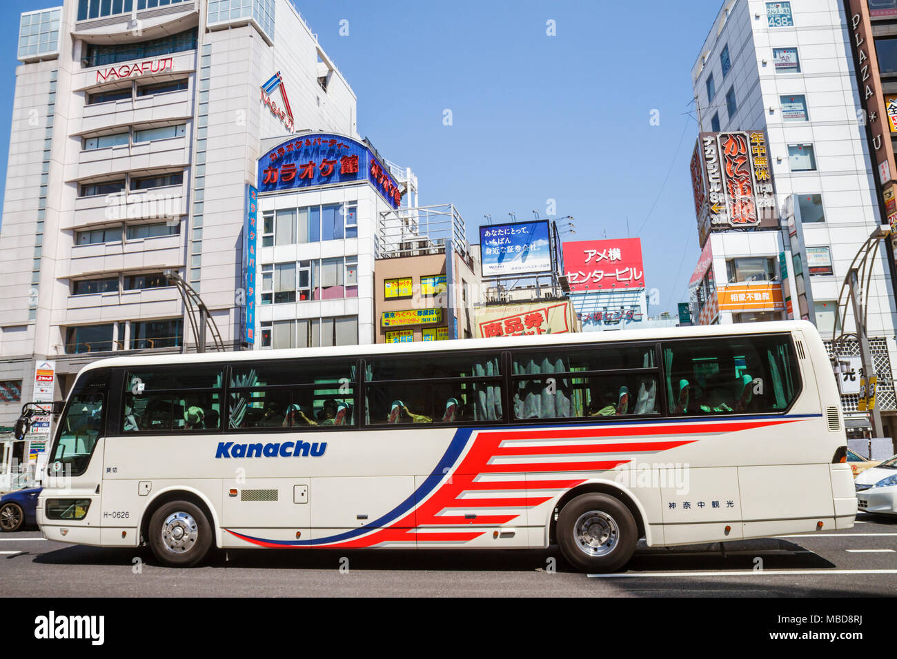 Tokyo Japan Asia Orient Ueno Chuo Dori Street Scene Kanji Japanese English Characters Symbols Bus Coach Signs Ad Advertising Advertisement Visitors Tr Stock Photo Alamy