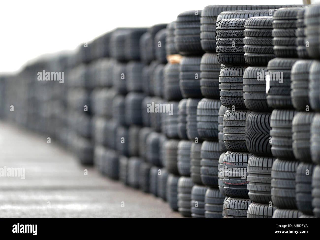 Tyre wall bordering the Regniowez circuit (northern France), racing circuit belonging to the 'Pole Mecanique des Ardennes'. Stock Photo