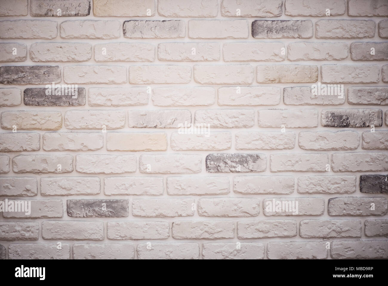 Gray and white brick wall background. Texture of painted brick Stock