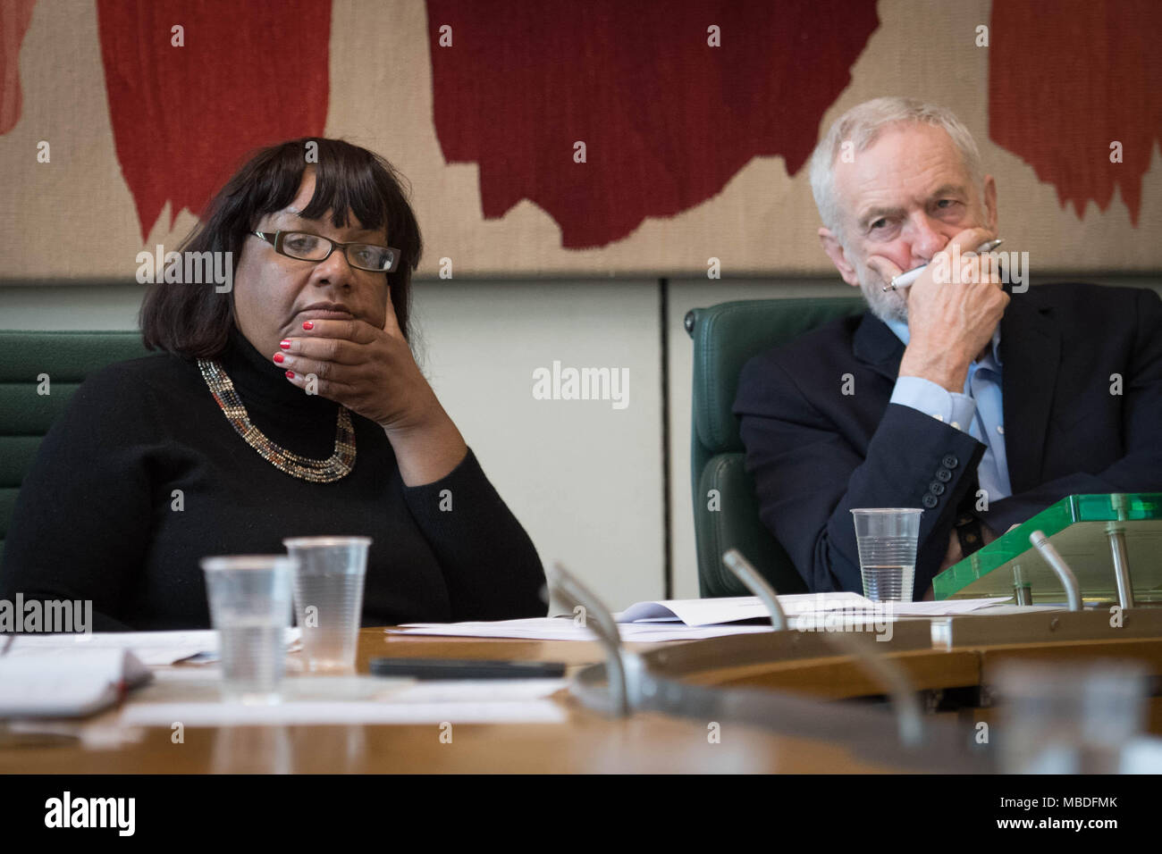 Labour leader Jeremy Corbyn hosts a gun and knife crime round table meeting in Portcullis House, London, with police officers and experts from organisations tackling gun and knife crime in Scotland. Stock Photo