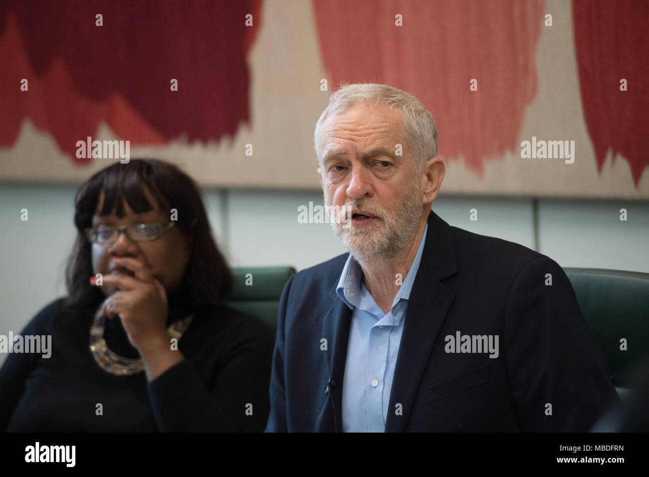 Shadow home secretary Diane Abbott and Labour leader Jeremy Corbyn during a gun and knife crime round table meeting in Portcullis House, London, with police officers and experts from organisations tackling gun and knife crime in Scotland. Stock Photo
