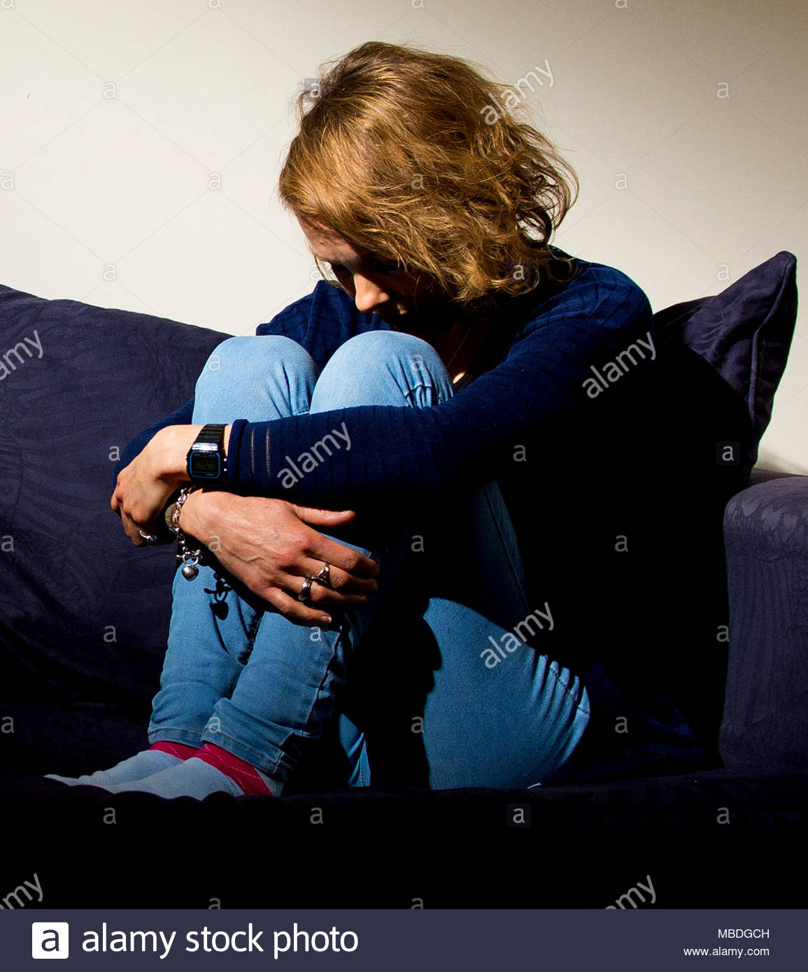 Knees To Chest Stock Photos & Knees To Chest Stock Images Alamy