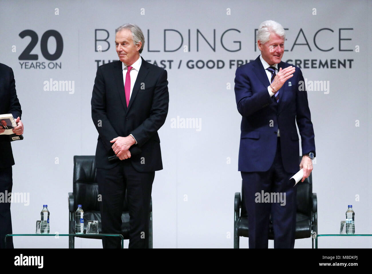 Former Prime Minister Tony Blair and former US President Bill Clinton at an event to mark the 20th anniversary of the Good Friday Agreement, at Queen's University in Belfast. Stock Photo