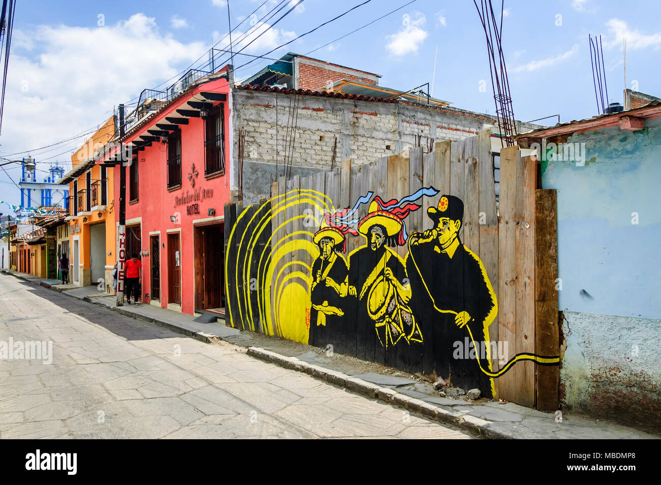 San Cristobal de las Casas, Mexico - March 26, 2015: Street scene with street art on wooden fence Stock Photo