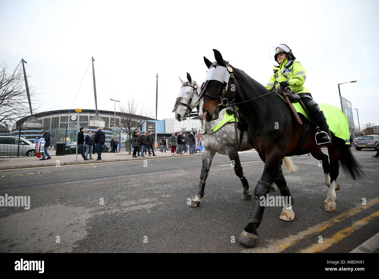 A general view of the ground and mounted police before the UEFA Champions League, Quarter Final at the Etihad Stadium, Manchester. Stock Photo