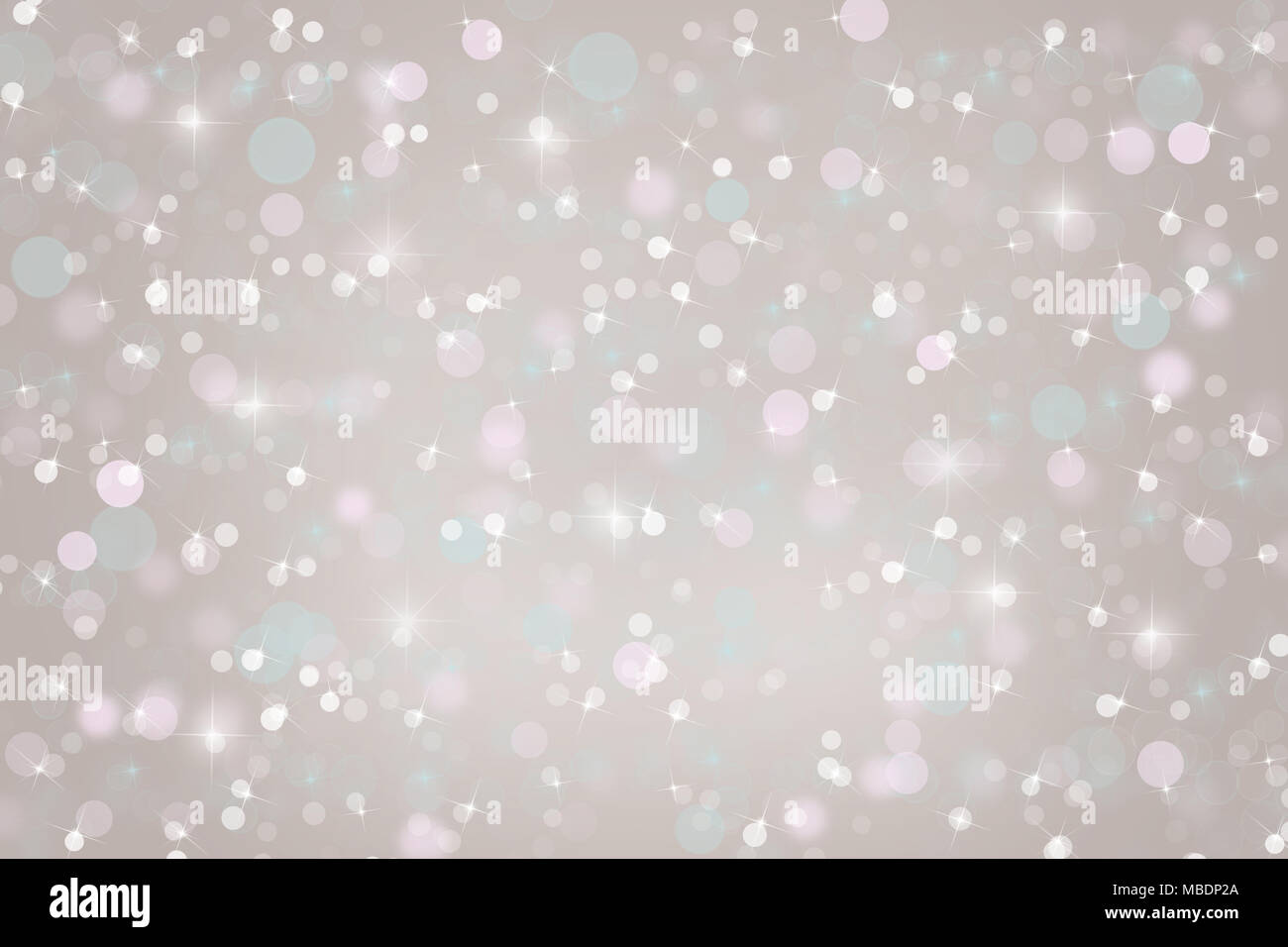 Abstract silver gray Christmas holiday winter background of falling snow bokeh, sparkles and glitter Stock Photo