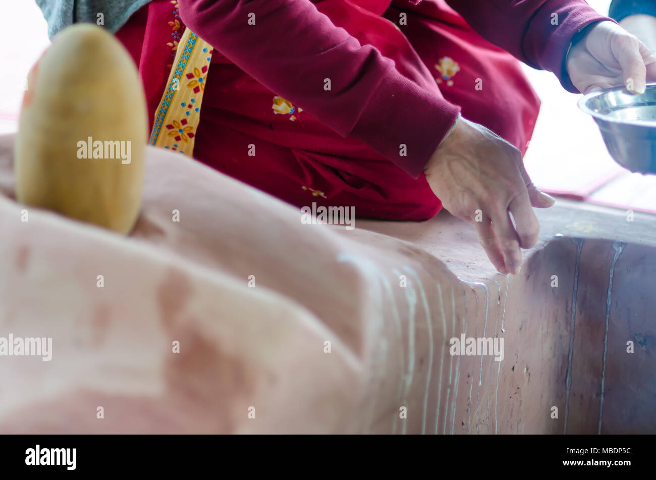 young girl who decorates the dhuni in the period of Guru Purnima Stock Photo