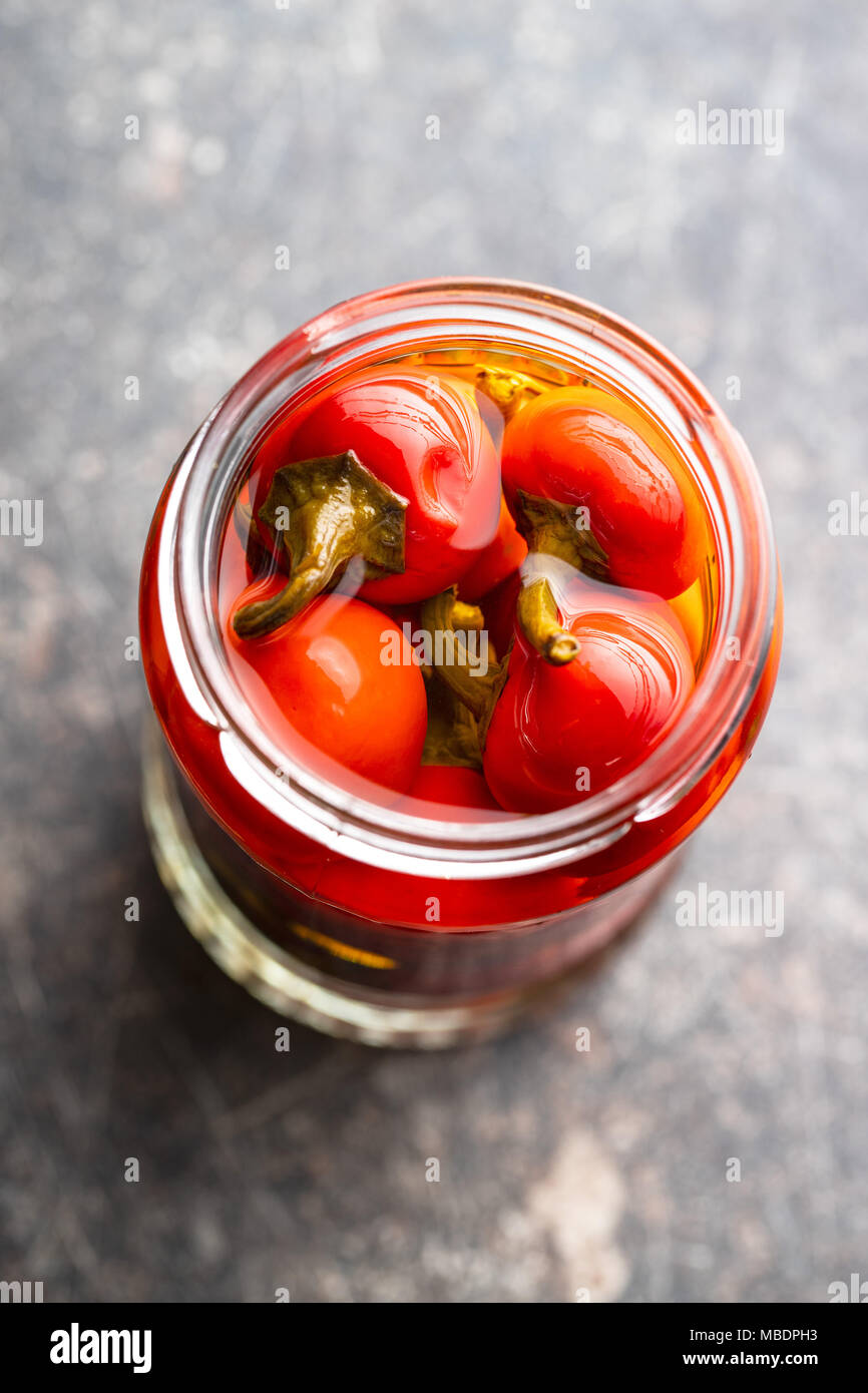 Pickled hot chili peppers. Marinated vegetable in jar Stock Photo Alamy