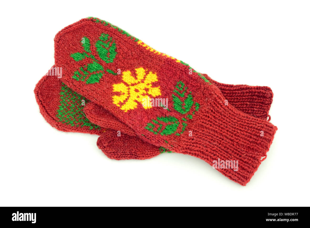 Two crocheted mittens on a white background Stock Photo