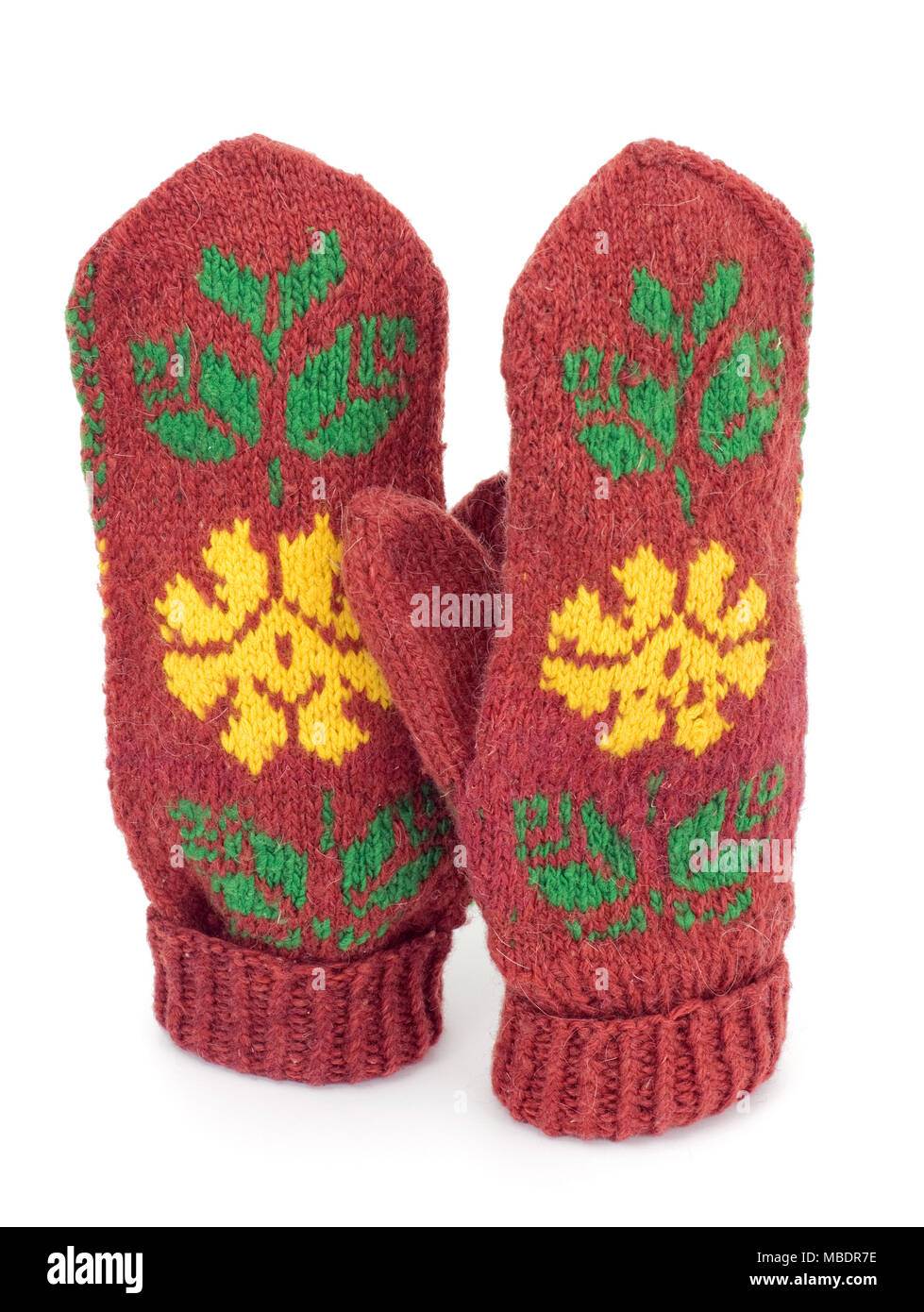 Two crocheted mittens on a white background Stock Photo