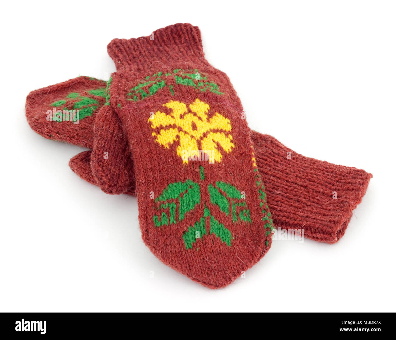 Two crocheted mittens on a white background Stock Photo