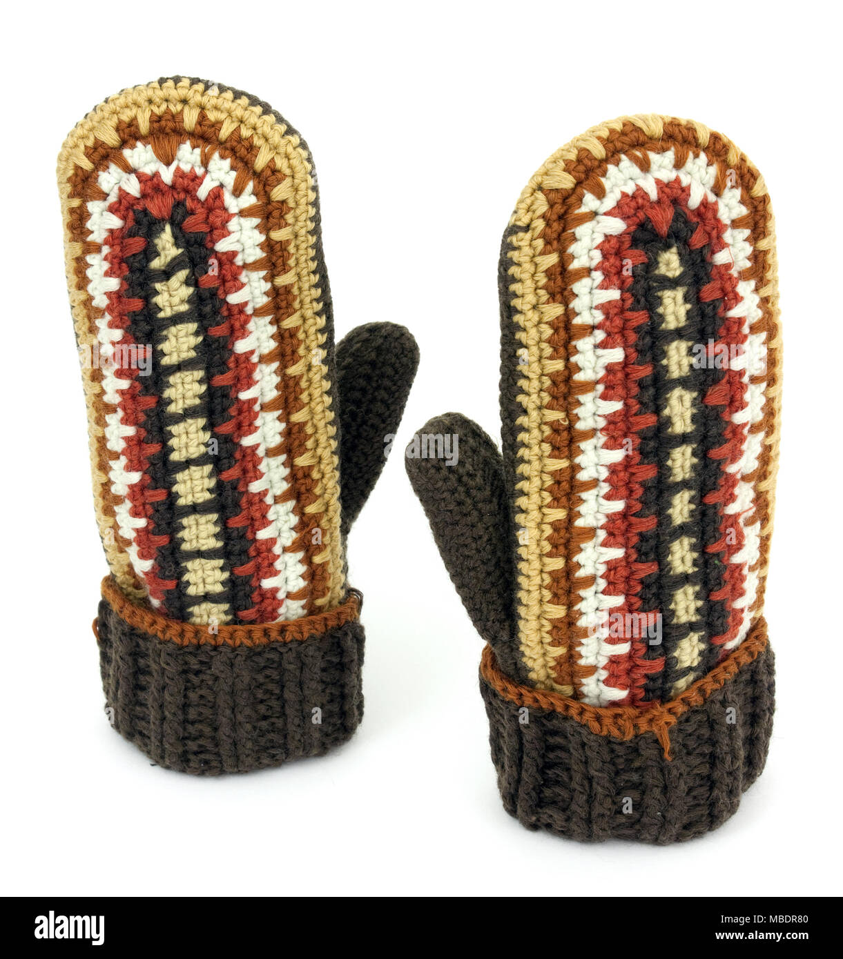 Two crocheted mittens on a white background Stock Photo
