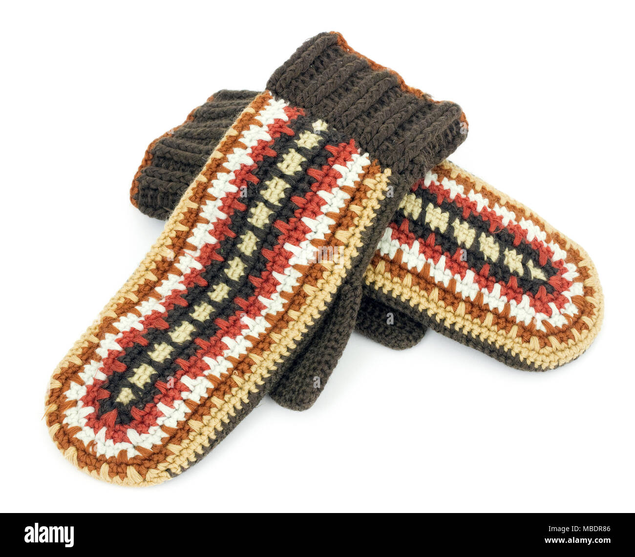 Two crocheted mittens on a white background Stock Photo