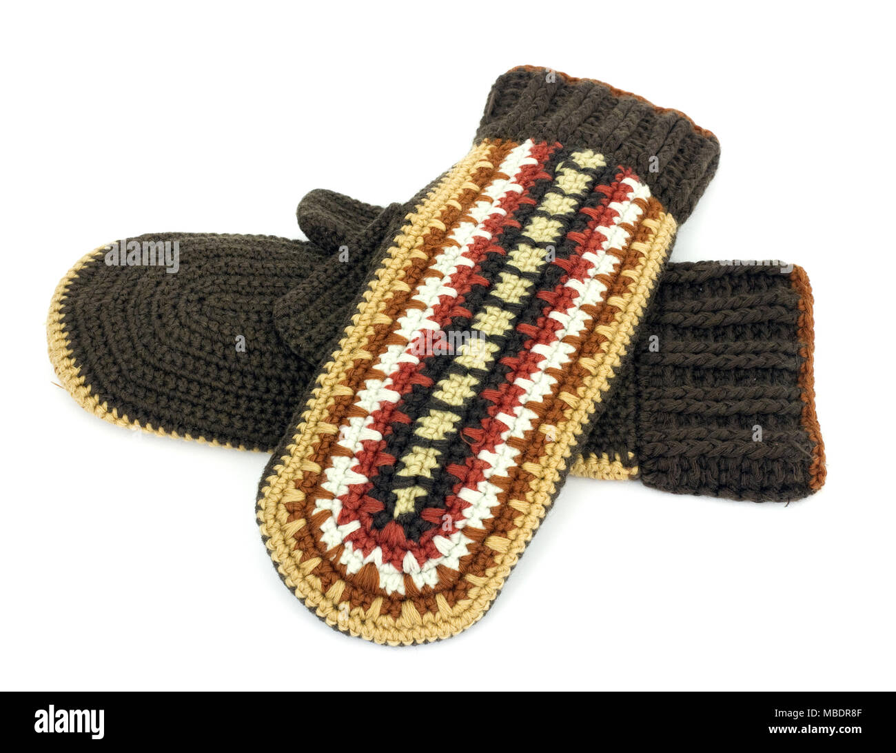 Two crocheted mittens on a white background Stock Photo