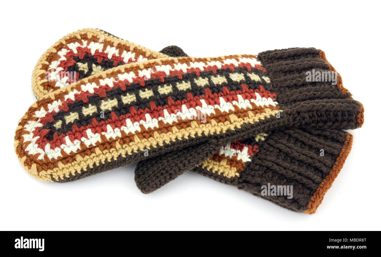 Two crocheted mittens on a white background Stock Photo