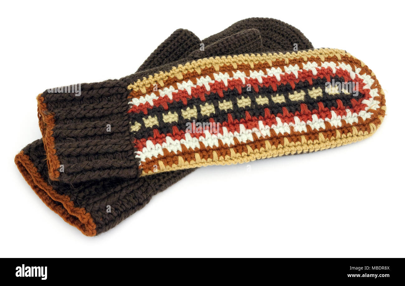 Two crocheted mittens on a white background Stock Photo