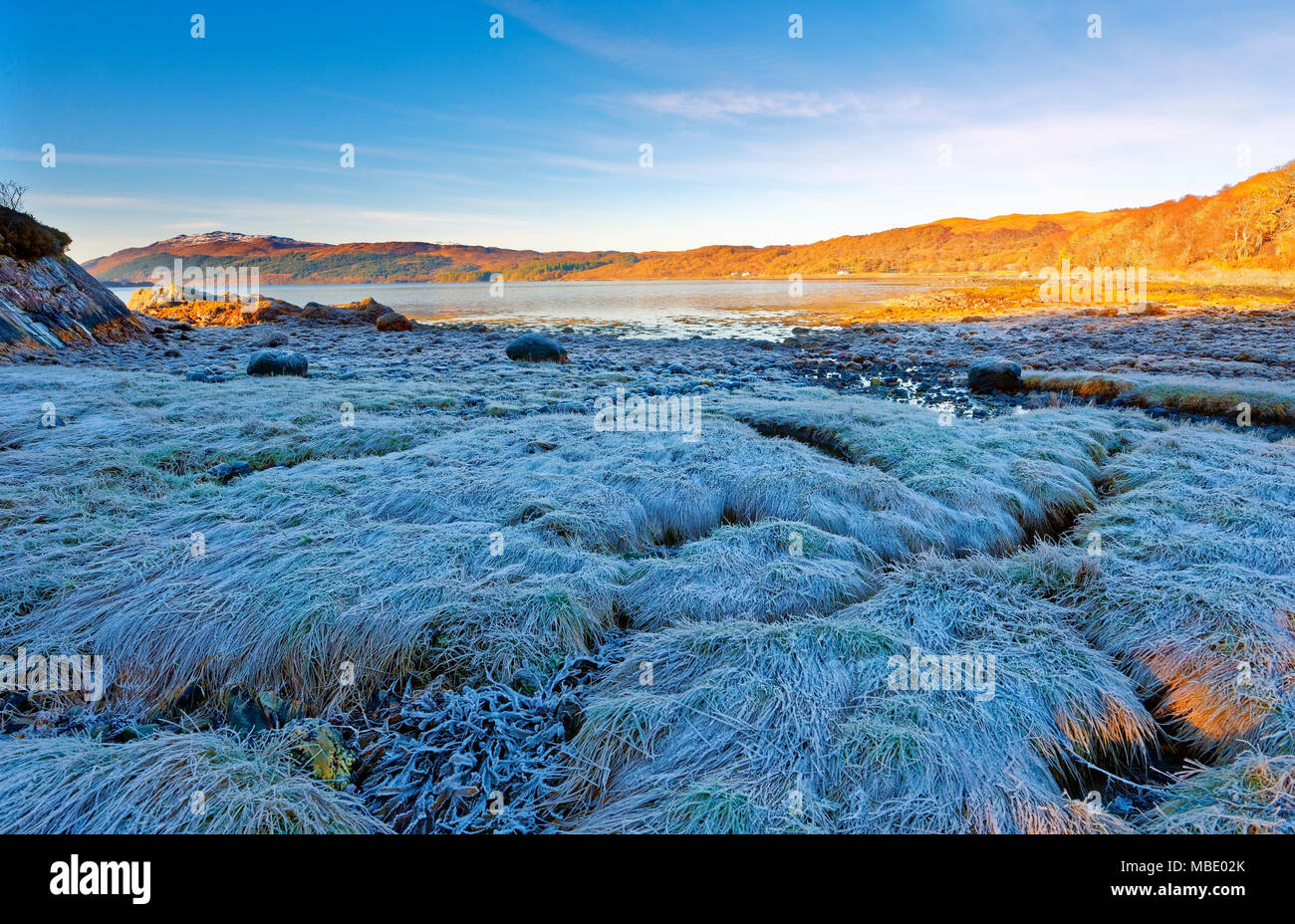 A sunny, autumn view of Loch Sunart in the Scottish Highlands as the first signs of winter appear. Stock Photo