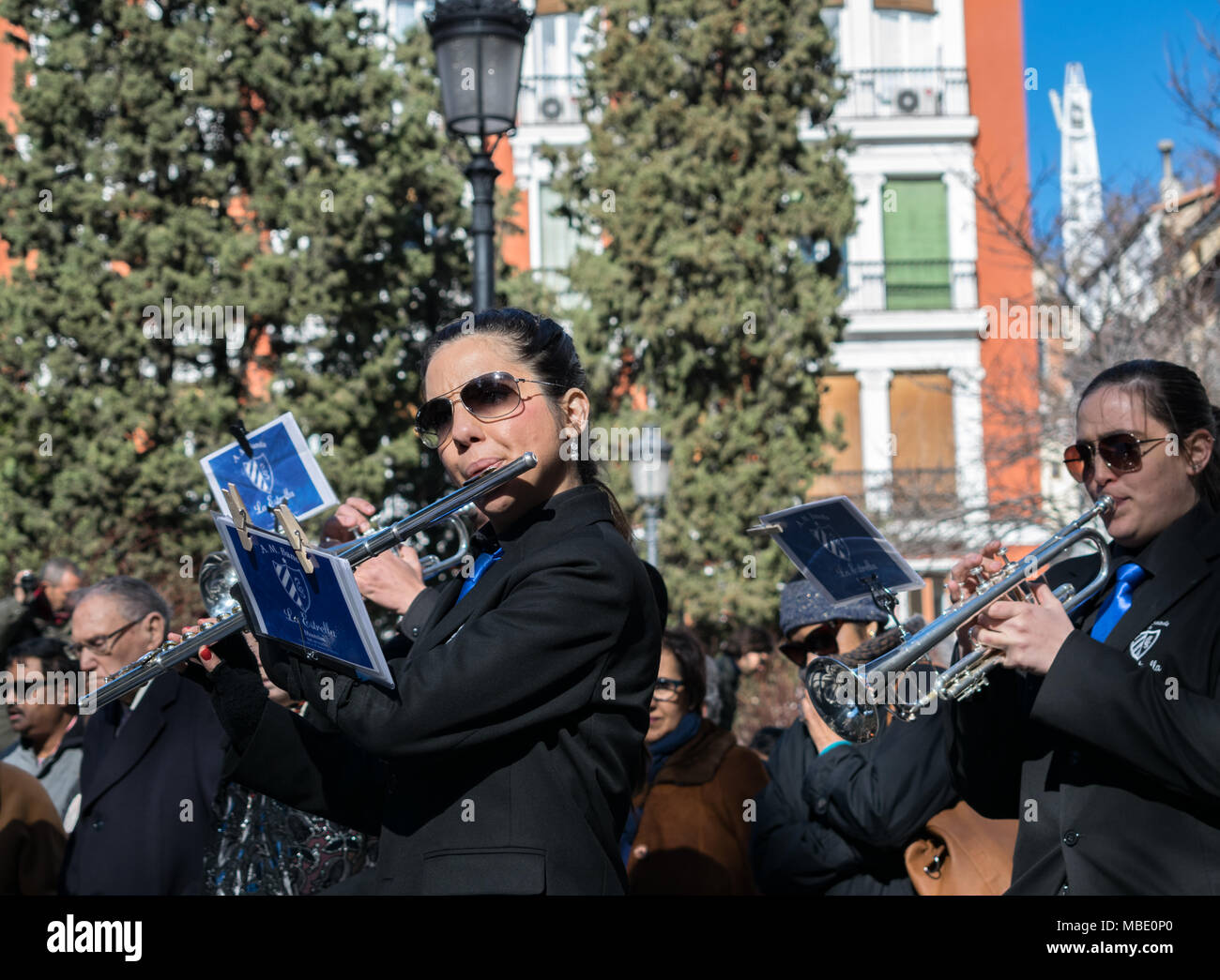 Flautist playing as part of a marching band in an Easter parade, Semana Santa (Holy Week) parades, Madrid, Spain, 2018 Stock Photo