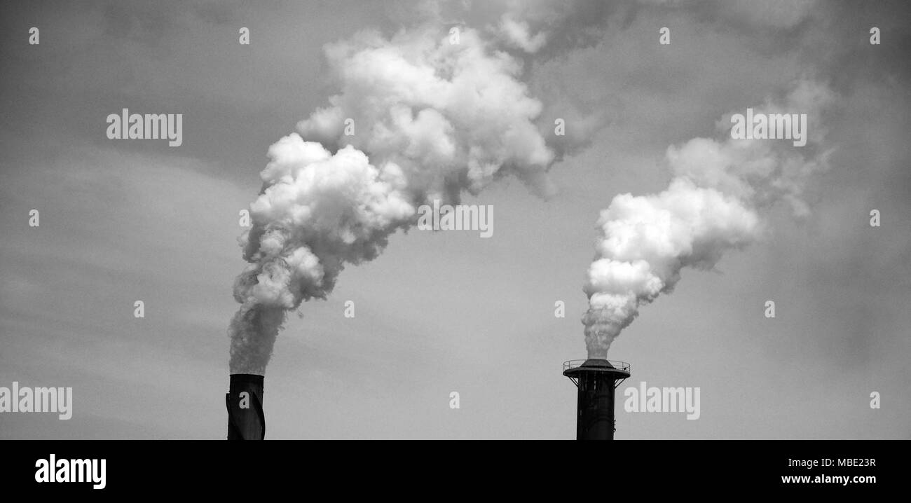 Industrial destruction, emission of toxic chemicals into the atmosphere Stock Photo