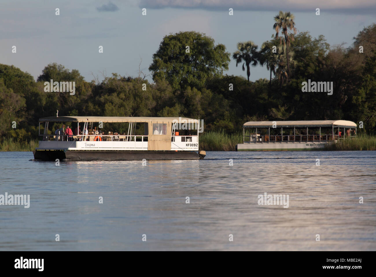 Boats during a sunset cruise on the Zambezi River near Victoria Falls