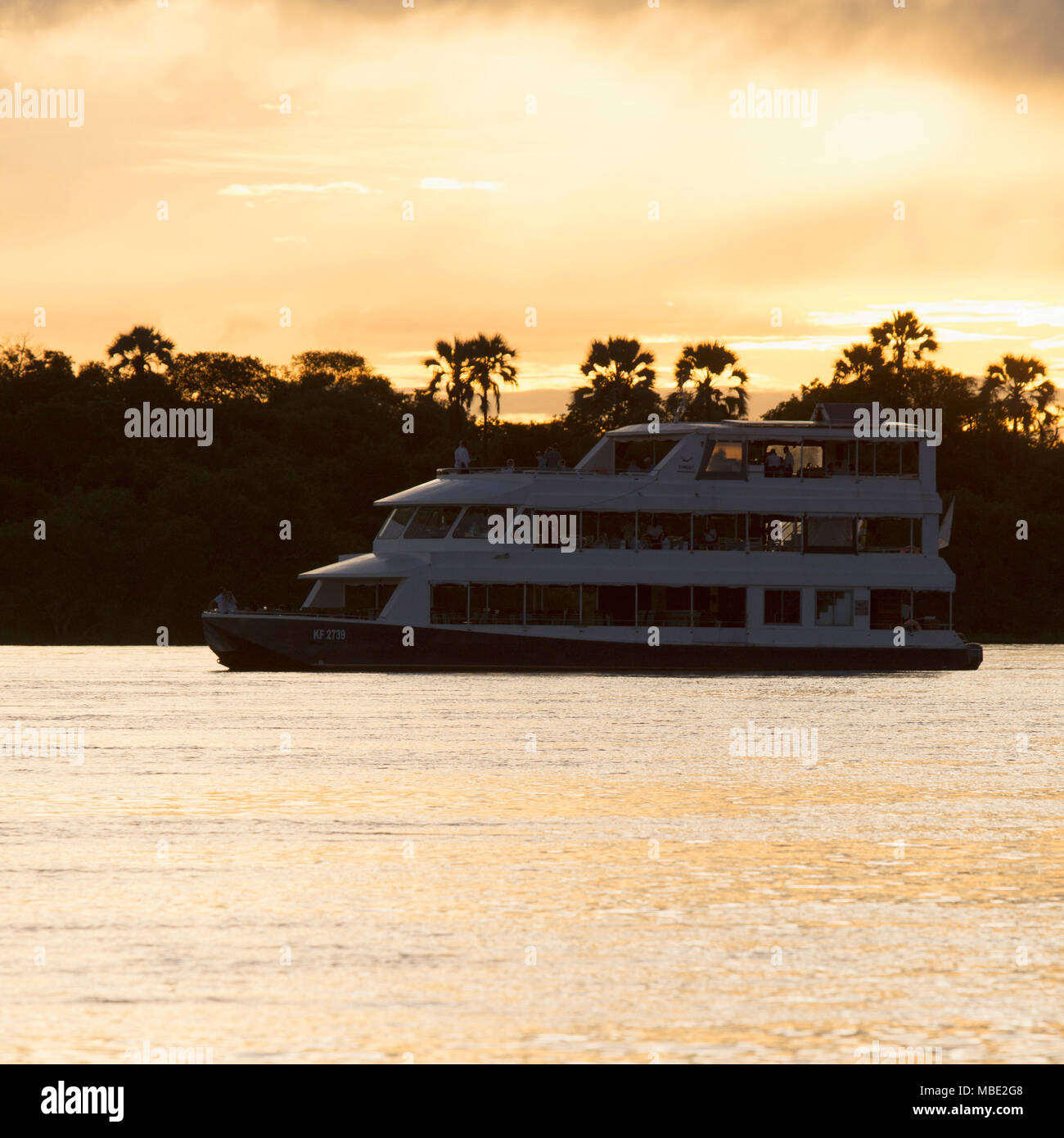 Boat during a sunset cruise on the Zambezi River near Victoria Falls in
