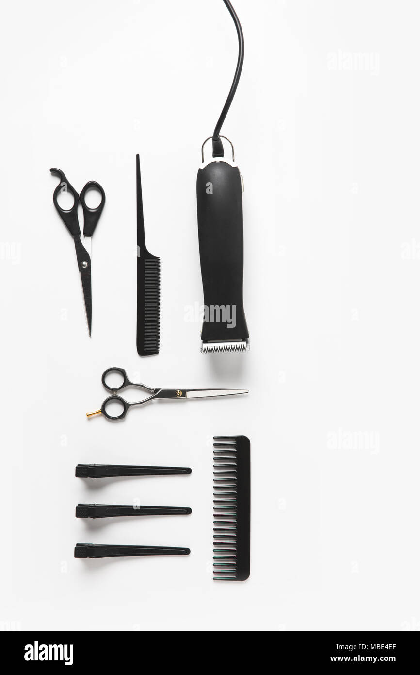flat lay with hair clipper and hairdressing equipment, isolated on white Stock Photo