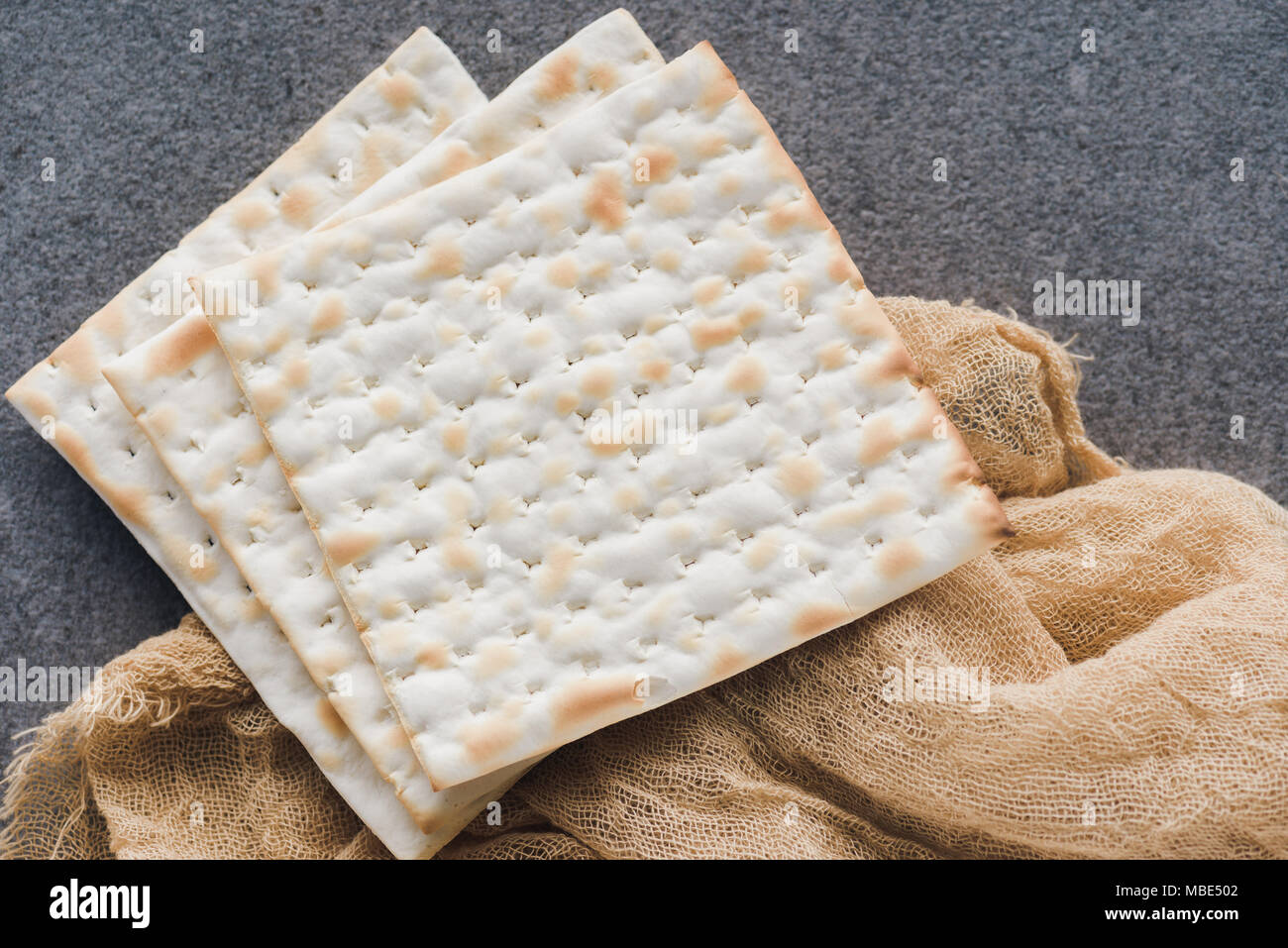 top view of matza on tablecloth, jewish Passover holiday concept Stock