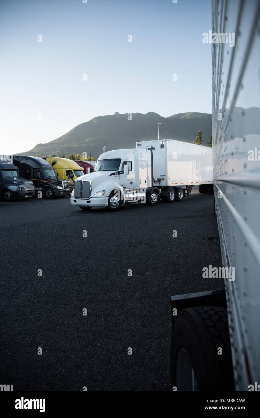 Trucks in the parking lot of a truck stop near Seattle, Washington, USA Stock Photo Alamy