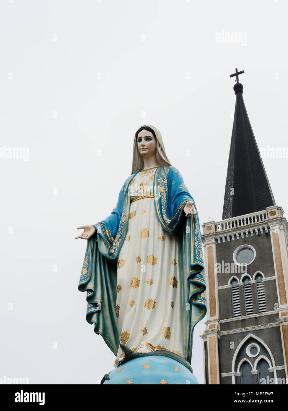 Blessed Virgin Mary, mother of Jesus, statue over cathedral with ...