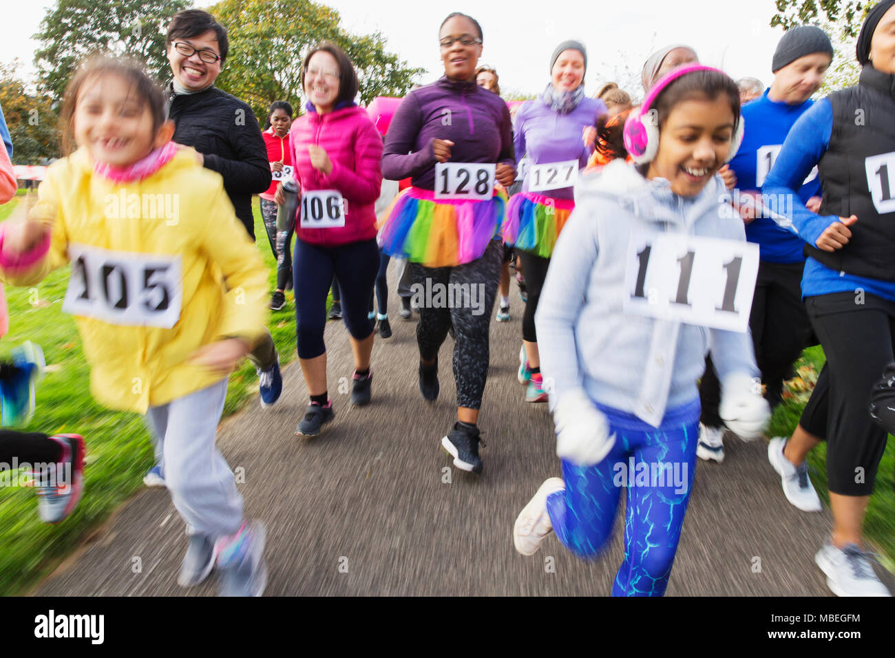 Runners running at charity run Stock Photo