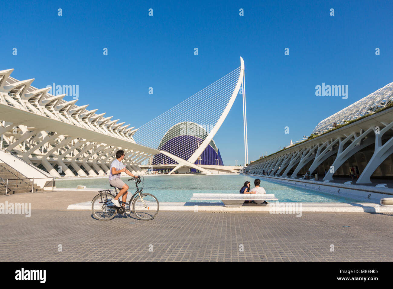 VALENCIA, SPAIN - JUNE 18, 2015: People relax at the pool with a view on Oceanografic in The city of arts and sciencies in Valencia, Spain Stock Photo