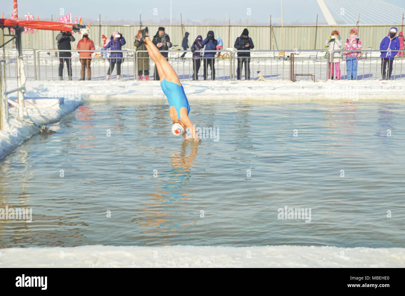 Winter swimming performance in Songhua River, Harbin Stock Photo