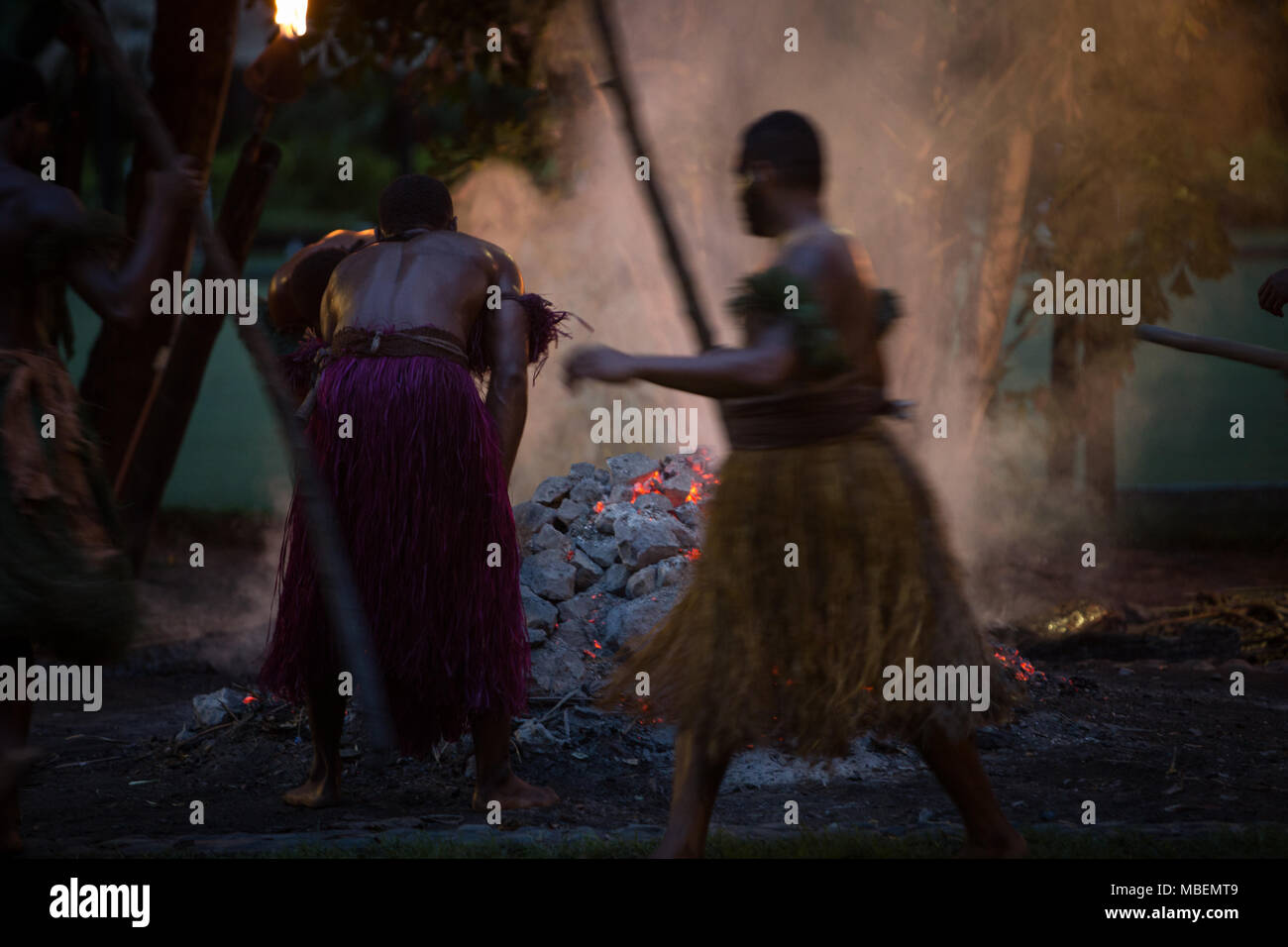 Fire walking display at a tourist resort hotel, in Nadi, Fiji, on 22 November 2017. Stock Photo