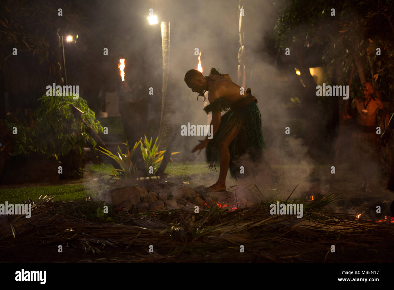 Fire walking display at a tourist resort hotel, in Nadi, Fiji, on 22 November 2017. Stock Photo