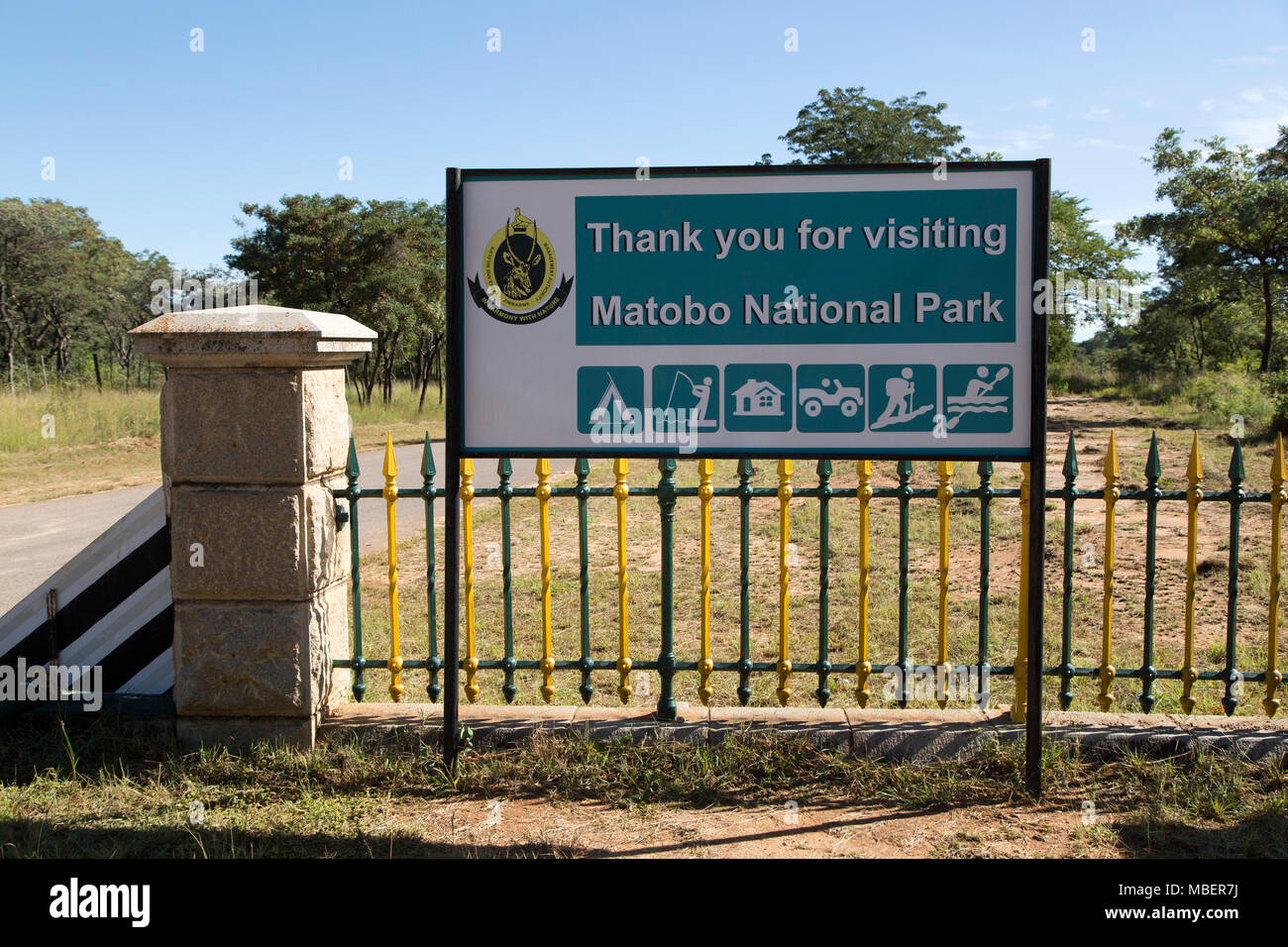A sign thanking people for visiting Matobo National Park in Zimbabwe. The national park is a UNESCO World Heritage Site. Stock Photo