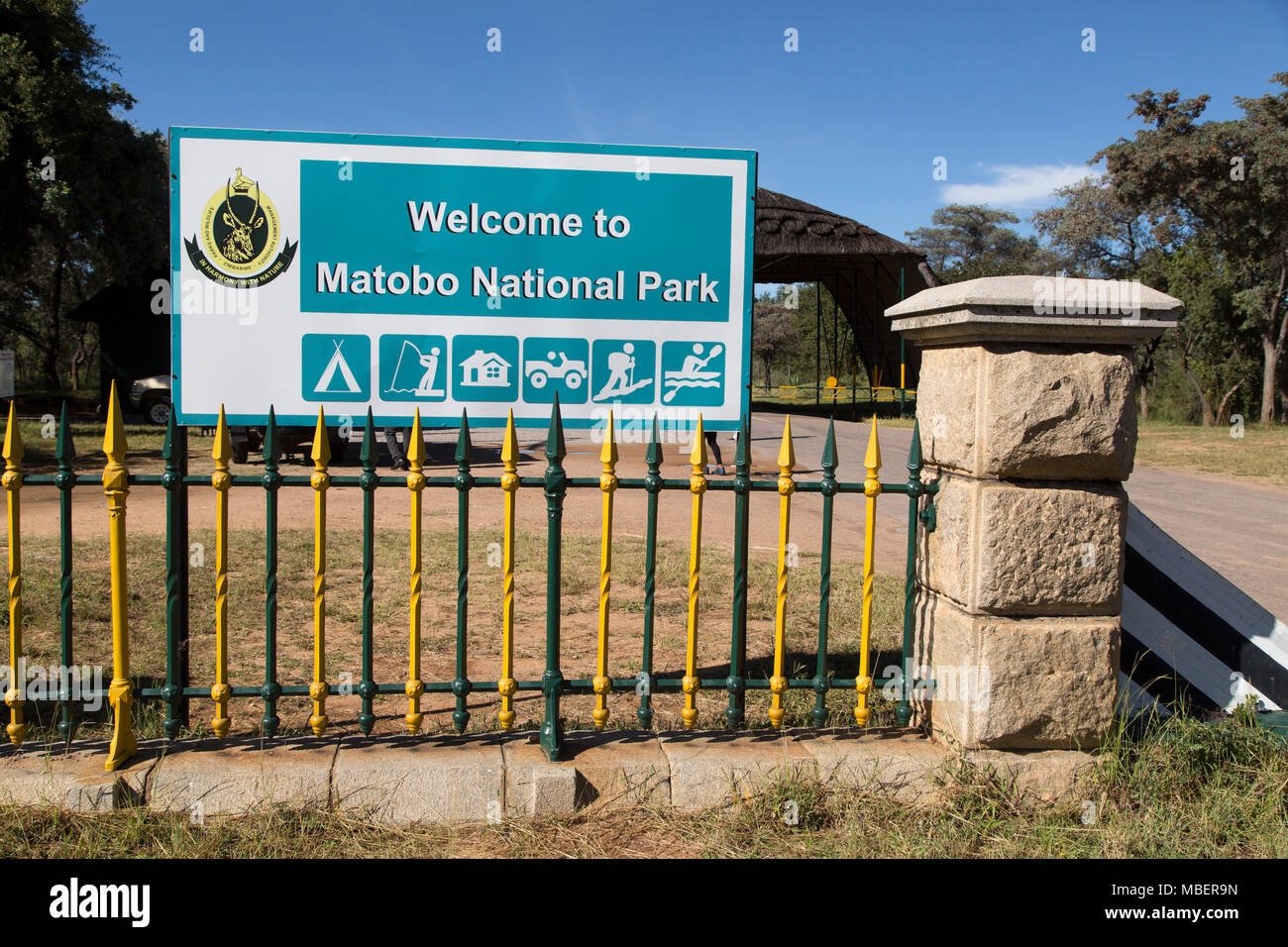 A sign welcoming people to Matobo National Park in Zimbabwe. The national park is a UNESCO World Heritage Site. Stock Photo