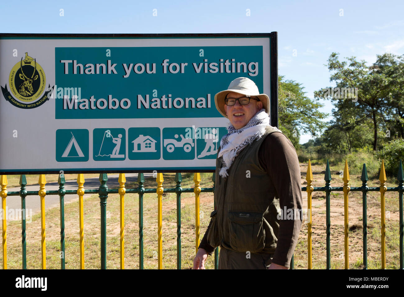 A male tourist at Matobo National Park in Zimbabwe. The national park is a UNESCO World Heritage Site. Stock Photo