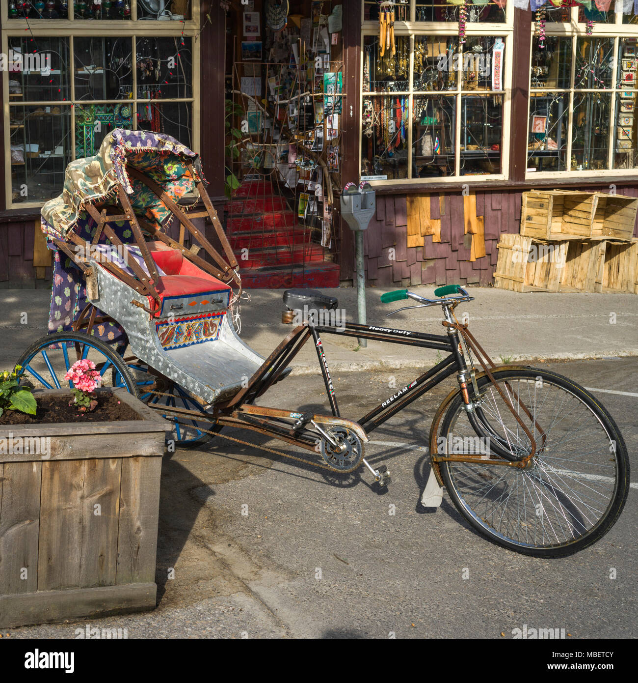Rickshaw parked outside store, Nelson, British Columbia, Canada Stock ...
