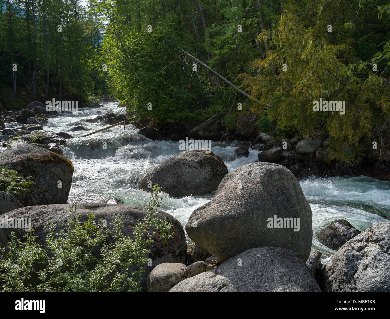 White rapids flowing through rocks, Riondel, British Columbia, Canada ...