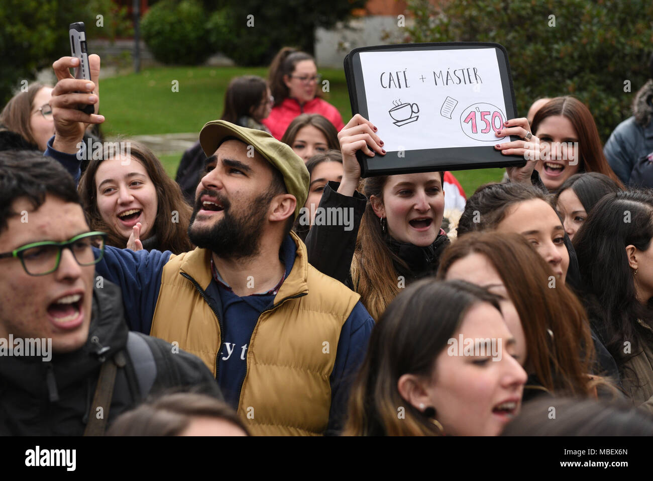 A Student Holds A Banner With A Message Against Corruption As She