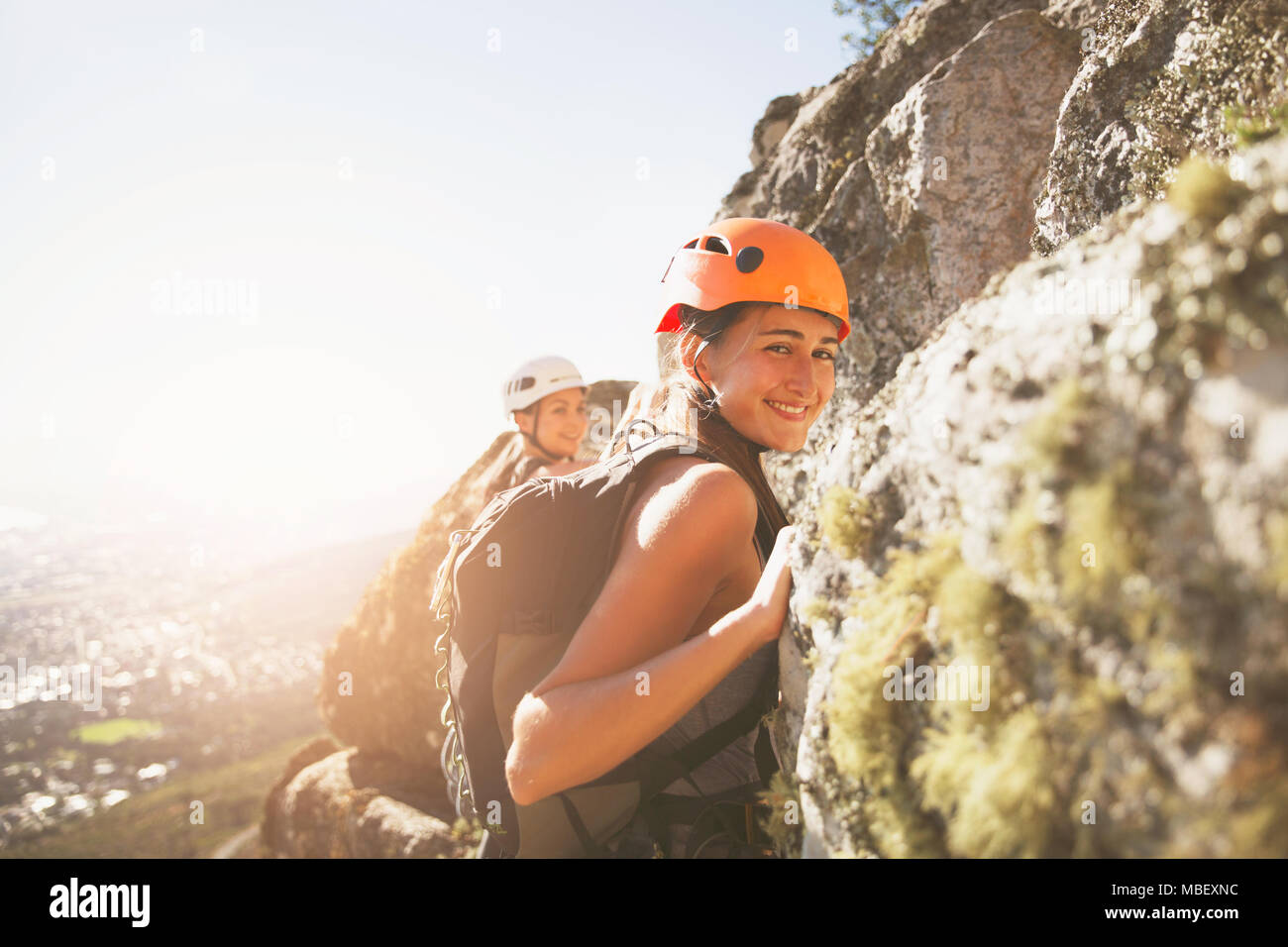 Portrait smiling female rock climber Stock Photo