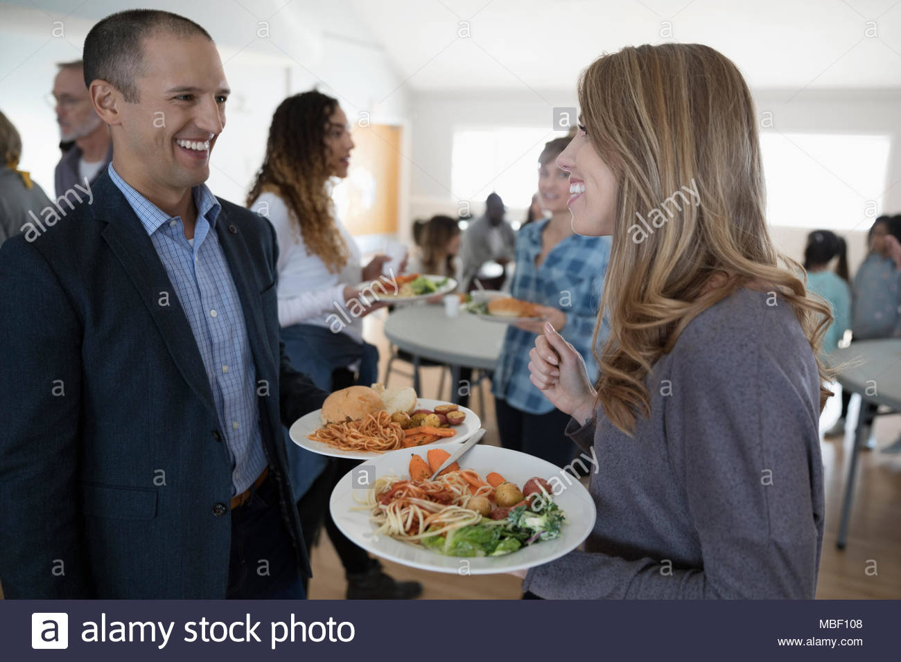 Community dinner hi-res stock photography and images - Alamy