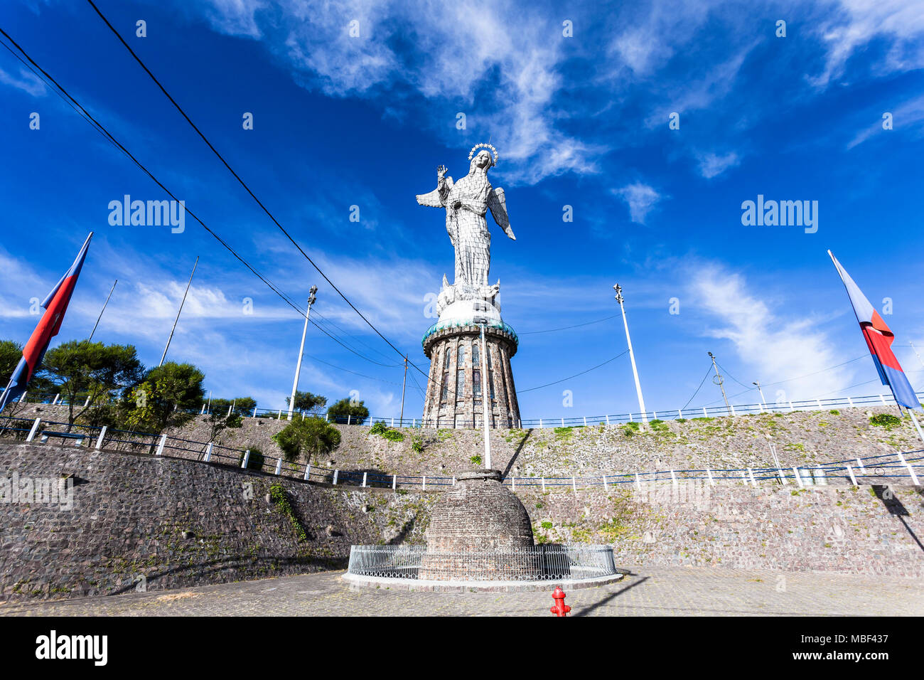 QUITO, ECUADOR - JUNE 14, 2015: The monument of the Virgen del Panecillo looks magnificent in the morning on top of the small hill in the center of th Stock Photo