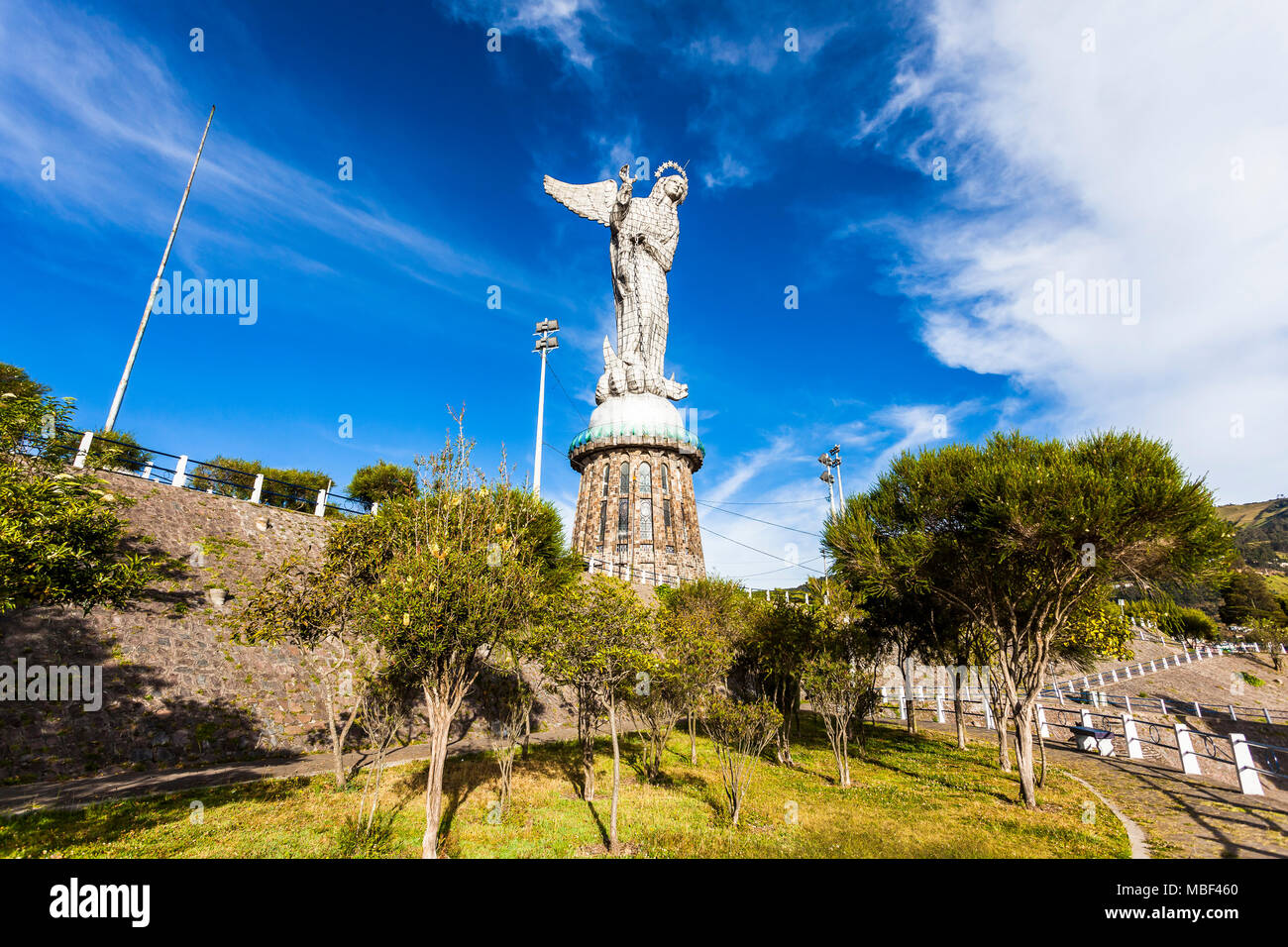 QUITO, ECUADOR - JUNE 14, 2015: The monument of the Virgen del Panecillo looks magnificent in the morning on top of the small hill in the center of th Stock Photo