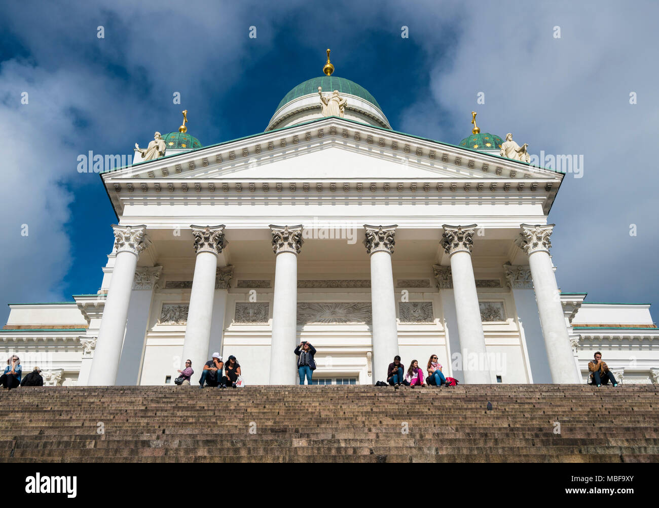 Tourists on the steps of Helsinki Cathedral, Helsinki, Finland, Europe Stock Photo